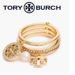Brand new Tory Burch Gold stackable size 7 , pearl, & crystal logo